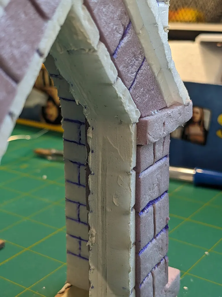 Heavy coat of spackle insdie the arch