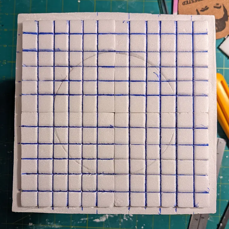 Four removable 3 inch tiles with a 1/2 inch grid